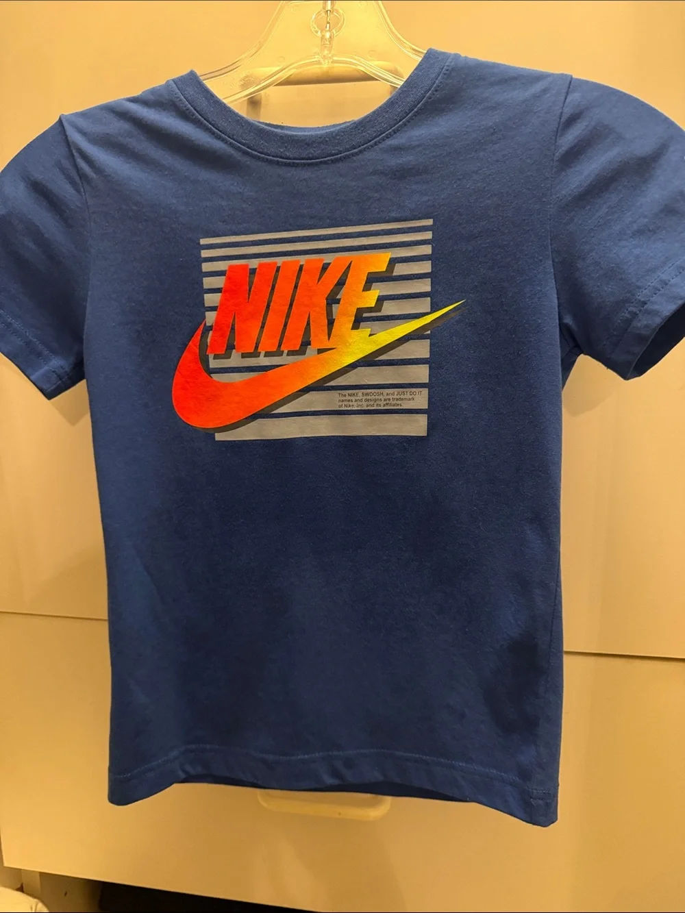 Nike Kids Blue Short-Sleeve Tee with Orange-to-Yellow Gradient Logo